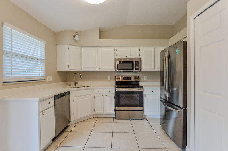 2,515/Mo, 10119 Pink Carnation Ct Orlando, FL 32825 Kitchen View