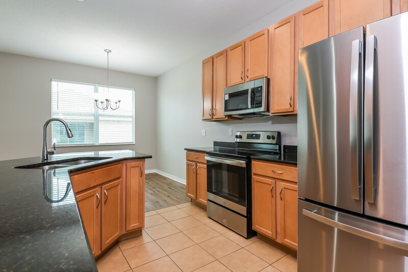 2,260/Mo, 636 Star Magnolia Dr Kissimmee, FL 34744 Kitchen View 2