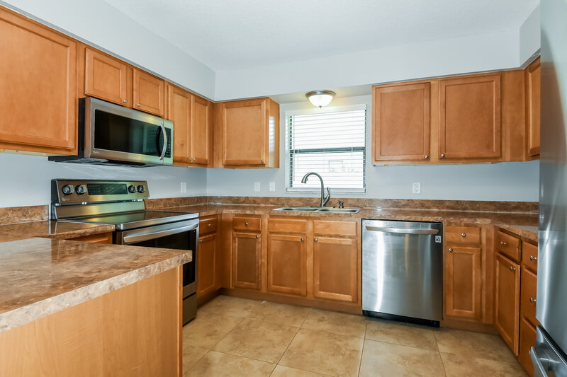 3,760/Mo, 10416 Calle de Flores Dr Clermont, FL 34711 Kitchen View 2