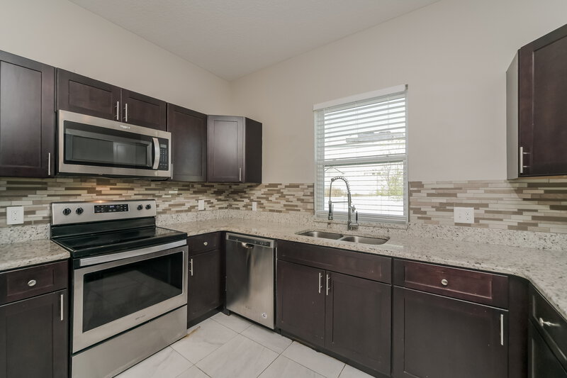 1,650/Mo, 1424 Kissimmee Ct Poinciana, FL 34759 Kitchen View 2