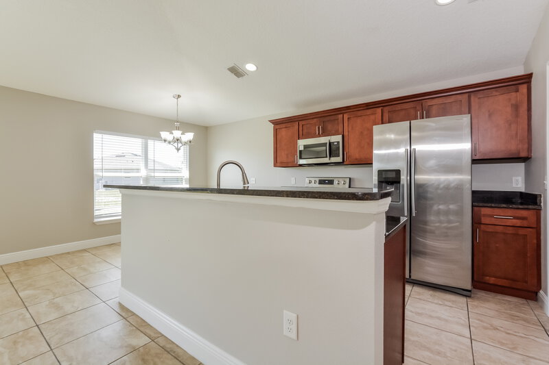 1,590/Mo, 42 Magnolia Blossom Ln Poinciana, FL 34759 Kitchen View 2