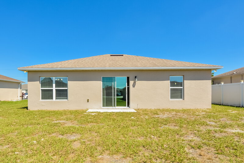 1,590/Mo, 42 Magnolia Blossom Ln Poinciana, FL 34759 Rear View