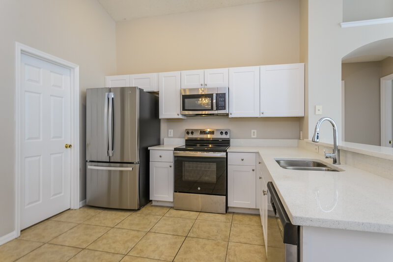 2,535/Mo, 7928 Magnolia Bend Ct Kissimmee, FL 34747 Kitchen View 2