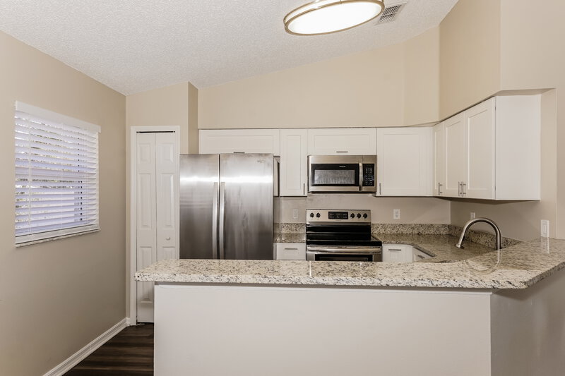 2,750/Mo, 2970 Bedford St Deltona, FL 32738 Kitchen View 2