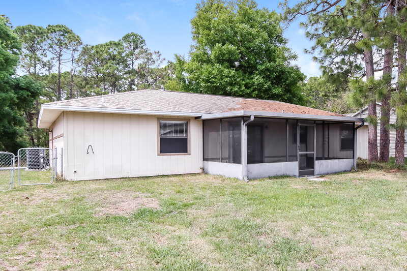 1,850/Mo, 833 Helm Ave NW Palm Bay, FL 32907 Rear View 2