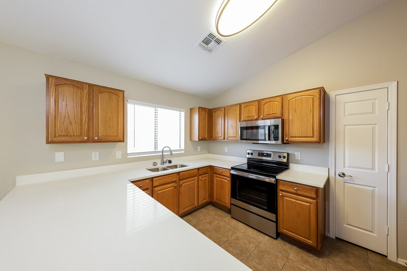 1,850/Mo, 11437 W McCaslin Rose Ln Surprise, AZ 85378 Kitchen View