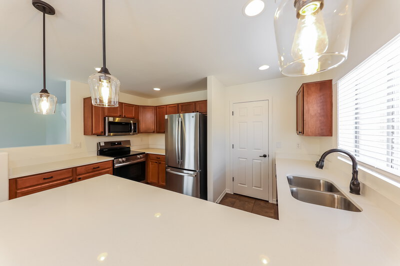 2,315/Mo, 11823 W Softwind Dr Sun City, AZ 85373 Kitchen View 2