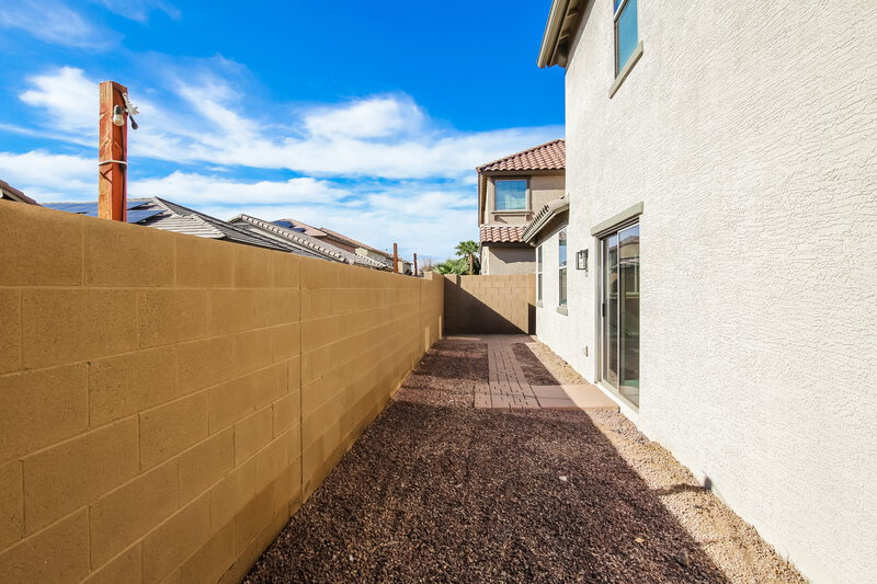 1,875/Mo, 943 E Agua Fria Ln Avondale, AZ 85323 Rear View