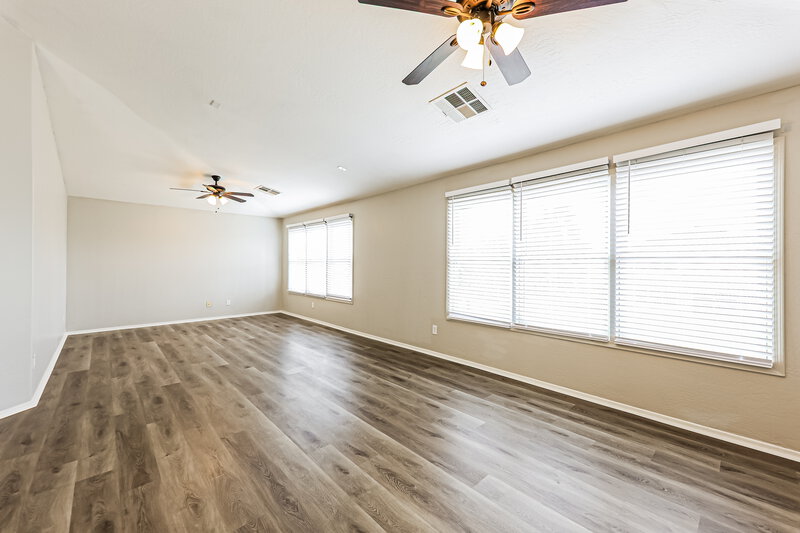 2,050/Mo, 18234 W Lundberg St Surprise, AZ 85388 Family Room View