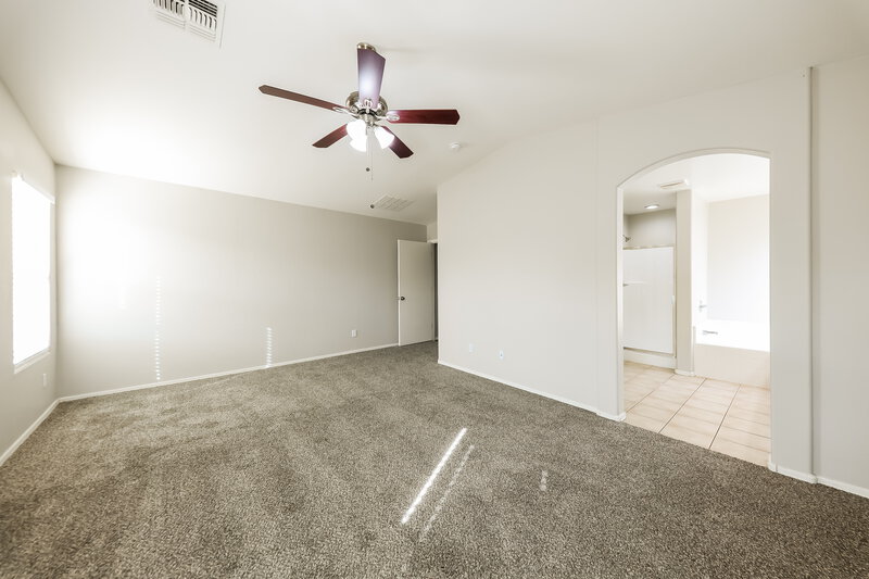 1,945/Mo, 15189 W Woodlands Ave Goodyear, AZ 85338 Main Bedroom View