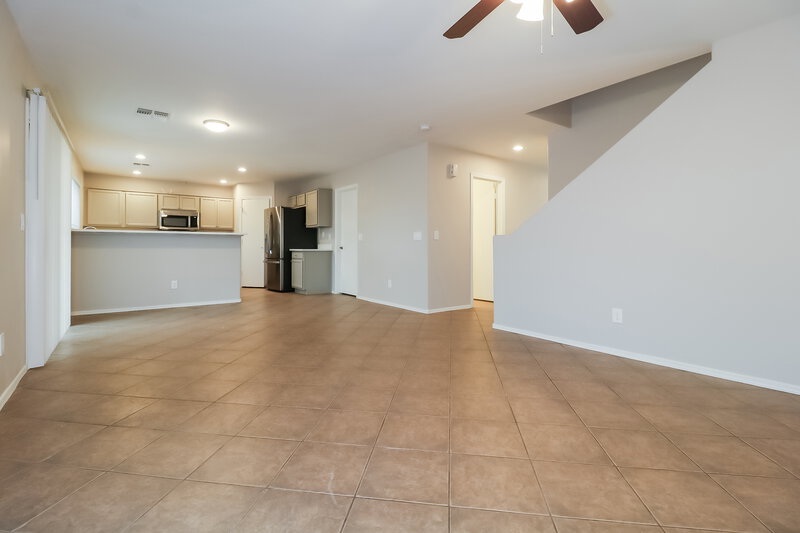 2,170/Mo, 24254 W Desert Bloom St Buckeye, AZ 85326 Family Room View 2