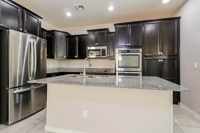 2,430/Mo, 16905 W Woodlands Ave Goodyear, AZ 85338 Kitchen View