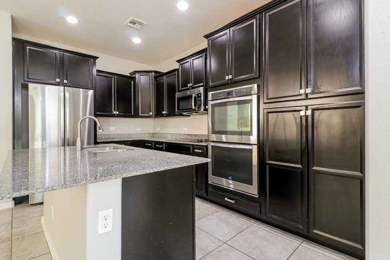 2,430/Mo, 16905 W Woodlands Ave Goodyear, AZ 85338 Kitchen View 2