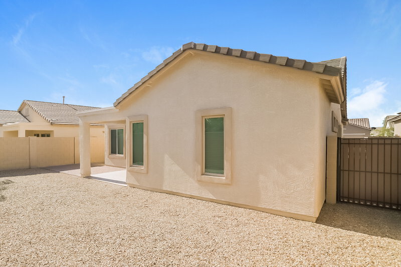1,930/Mo, 19284 W Woodlands Ave Buckeye, AZ 85326 Rear View