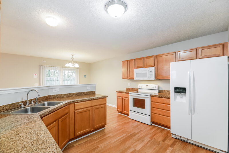 2,180/Mo, 4904 Tommans Trl Raleigh, NC 27616 Kitchen View 2