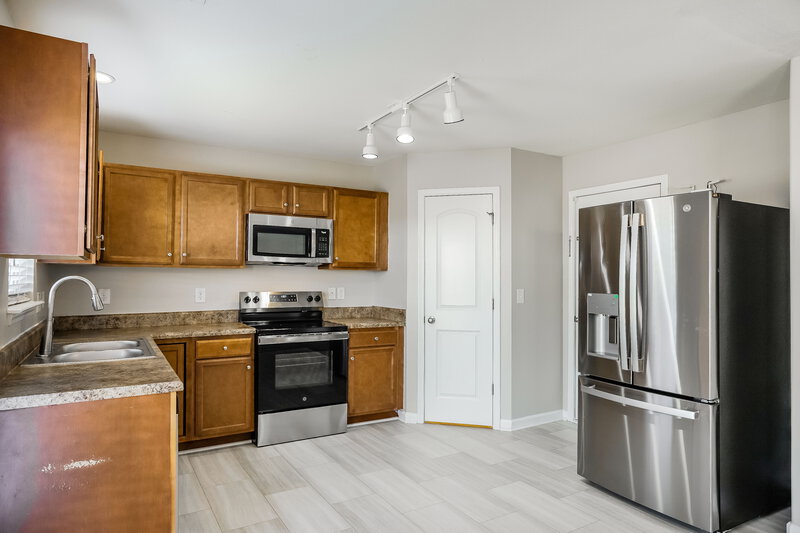 2,090/Mo, 4745 Queen Pierrette Street Raleigh, NC 27610 Kitchen View 2