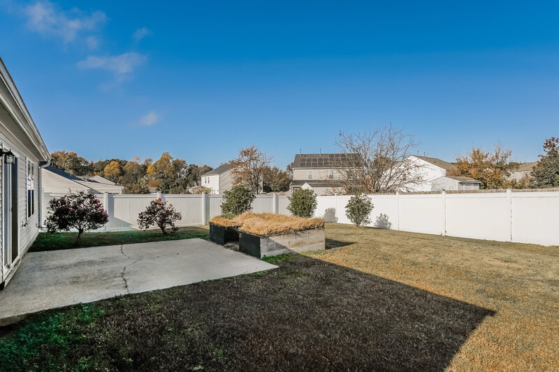 1,825/Mo, 2004 Olive Tree Ln Clayton, NC 27520 Backyard View