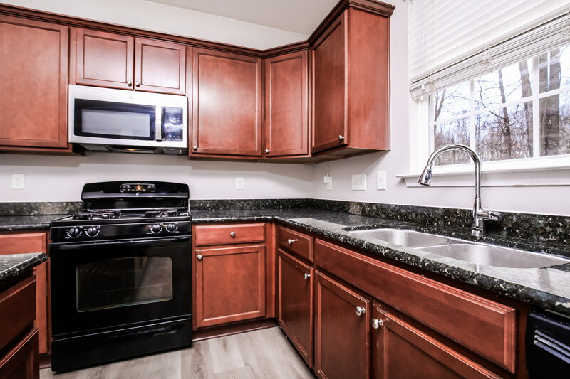 2,000/Mo, 1304 Cathedral Rock Ct Raleigh, NC 27610 Kitchen View 2