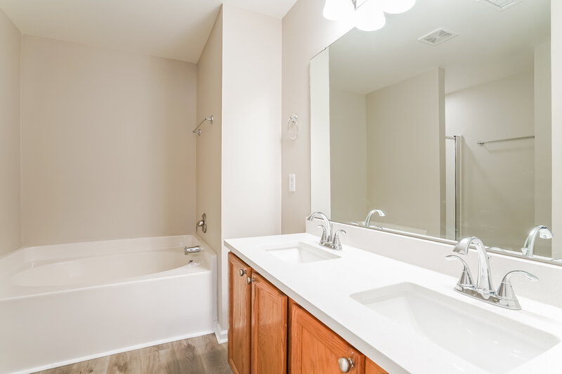 2,070/Mo, 3928 Tyler Bluff Ln Raleigh, NC 27616 Main Bathroom View