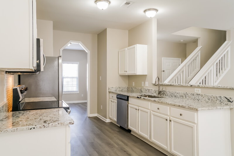 2,165/Mo, 8039 Marsh Hollow Dr Raleigh, NC 27616 Kitchen View 2