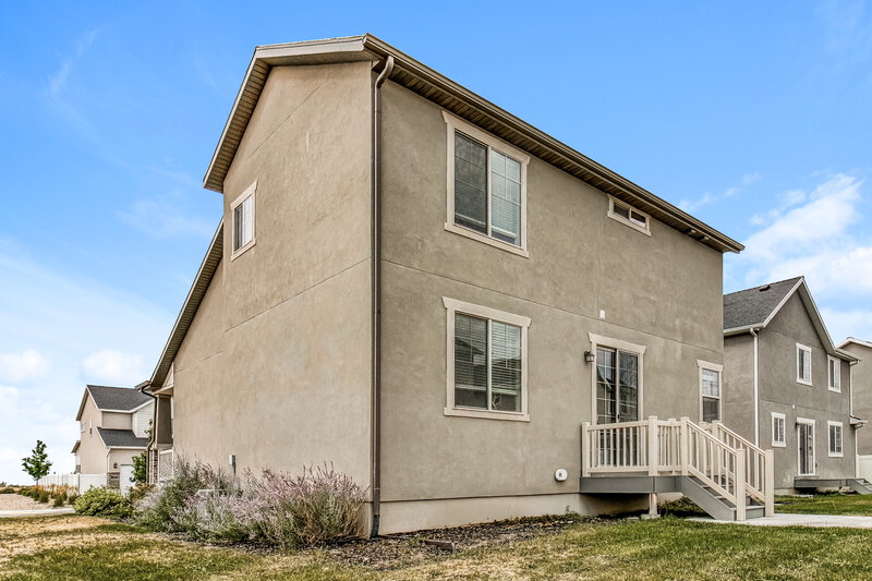 2,250/Mo, 1083 W Osprey Dr Stansbury Park, UT 84074 Rear View