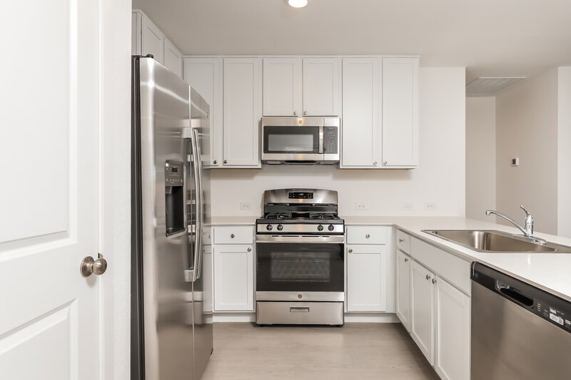 1,485/Mo, 10035 Mather Way Converse, TX 78109 Kitchen View 2