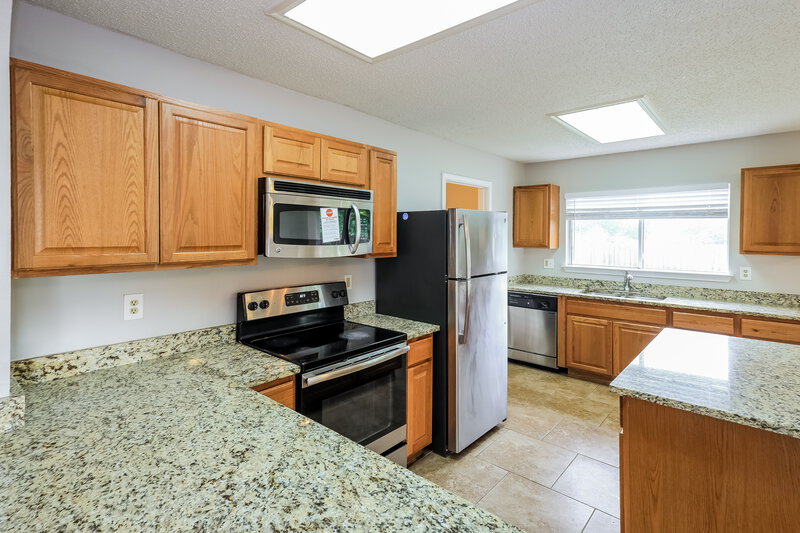 1,910/Mo, 9803 Raven Field Dr San Antonio, TX 78245 Kitchen View 2