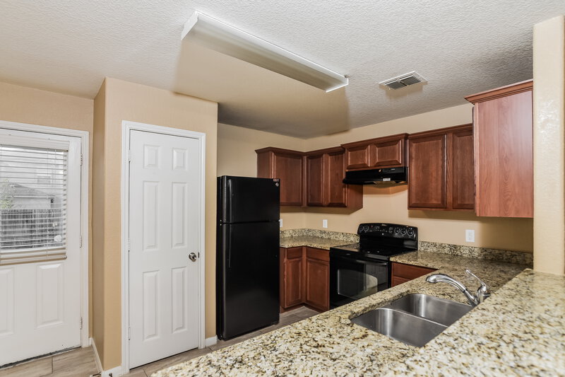 1,610/Mo, 11318 Quiet Canyon San Antonio, TX 78252 Kitchen View 2