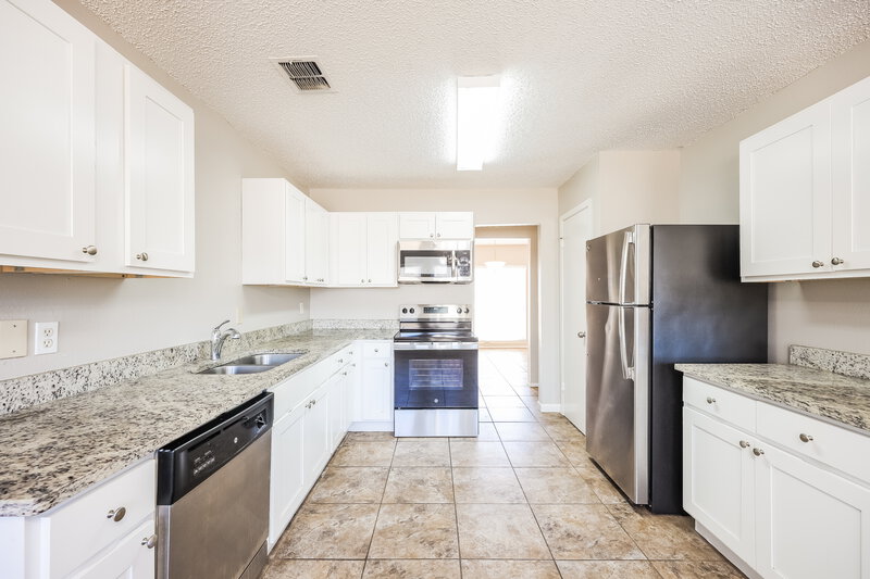 1,510/Mo, 7601 Tarrasa Dr San Antonio, TX 78239 Kitchen View 2