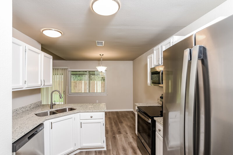 2,710/Mo, 9478 Greens Pt San Antonio, TX 78250 Kitchen View