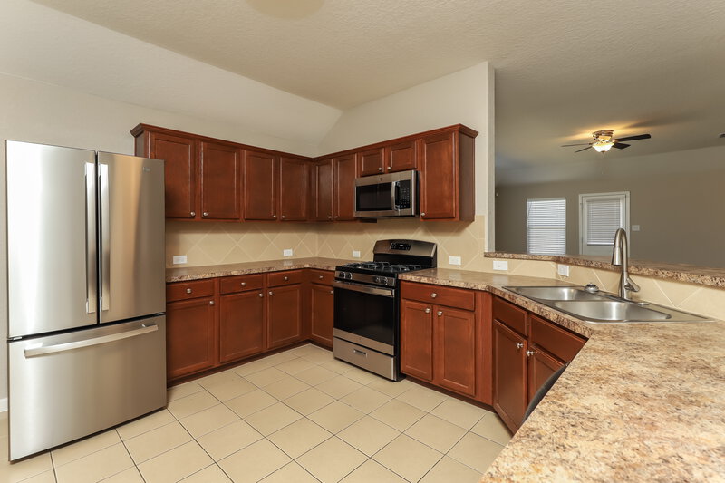 1,945/Mo, 8450 Pale Horse Ln San Antonio, TX 78254 Kitchen View