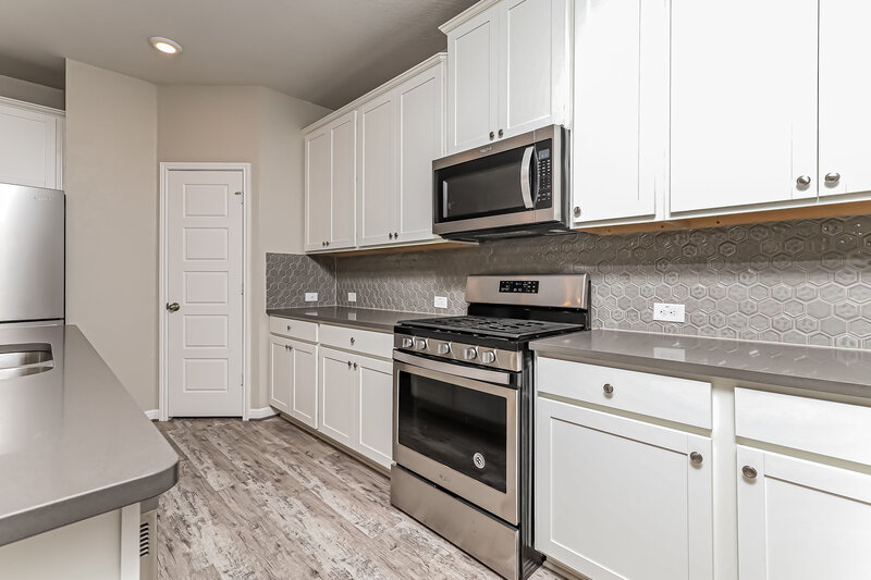 2,610/Mo, 11623 Troubadour Trl San Antonio, TX 78245 Kitchen View