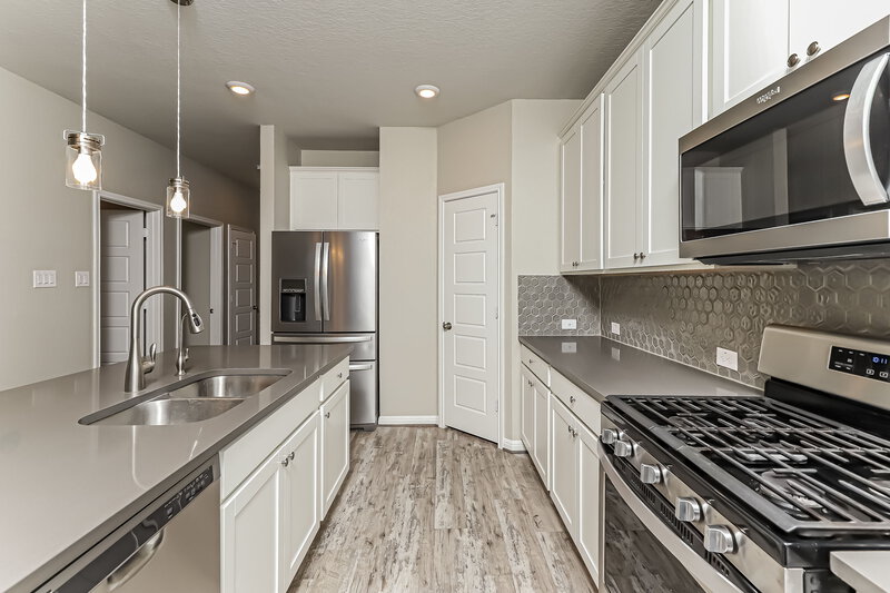 2,610/Mo, 11623 Troubadour Trl San Antonio, TX 78245 Kitchen View 2