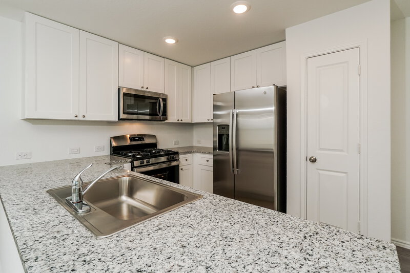 1,985/Mo, 9427 Strand Ct San Antonio, TX 78245 Kitchen View 2