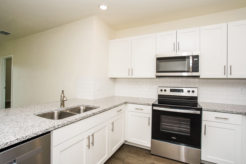 2,645/Mo, 4061 Shady Foxtail Ct Sarasota, FL 34240 Kitchen View 2