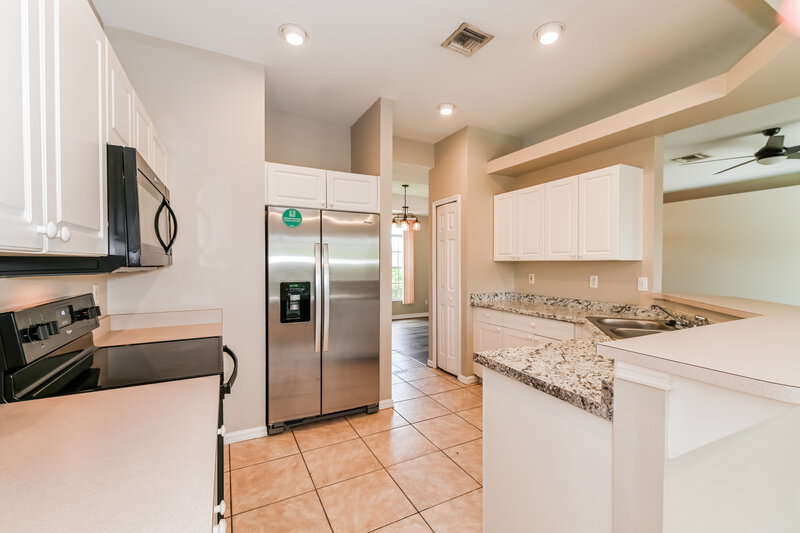 2,435/Mo, 3421 SW 26th Ave Cape Coral, FL 33914 Kitchen View 2