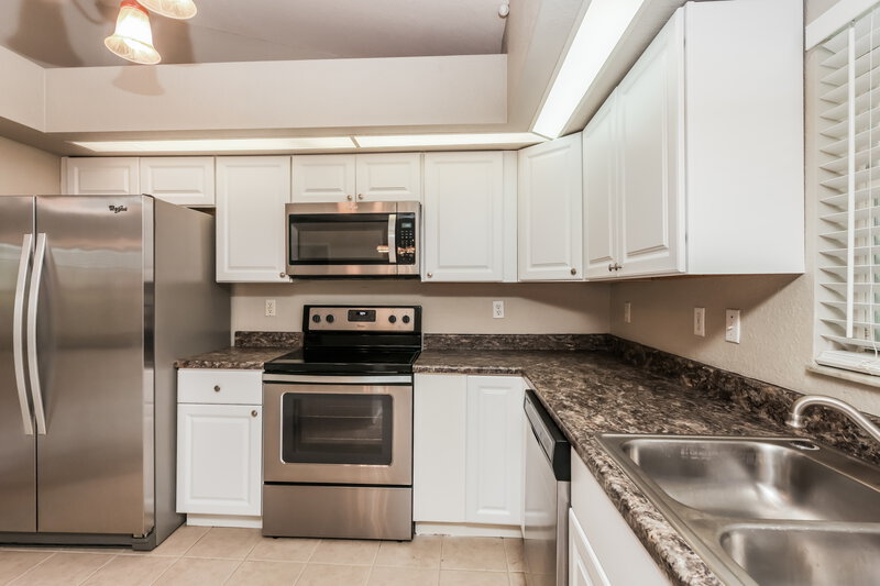 2,475/Mo, 1427 SE 12th St Cape Coral, FL 33990 Kitchen View 2