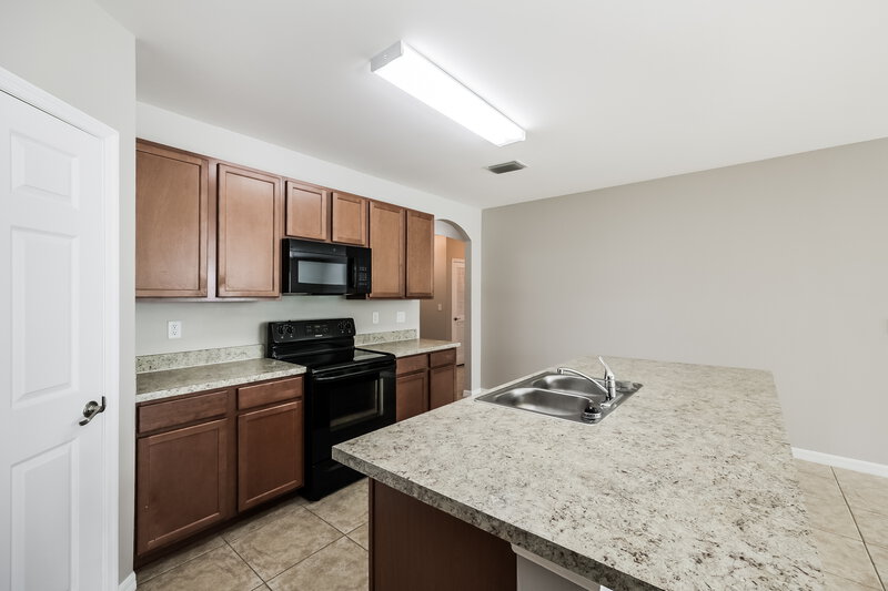 2,330/Mo, 4222 SW 13th Ave Cape Coral, FL 33914 Kitchen View 2