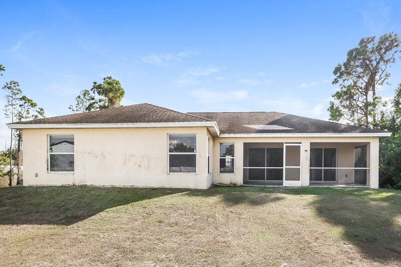 1,890/Mo, 1207 Summa Blvd Lehigh Acres, FL 33974 Rear View