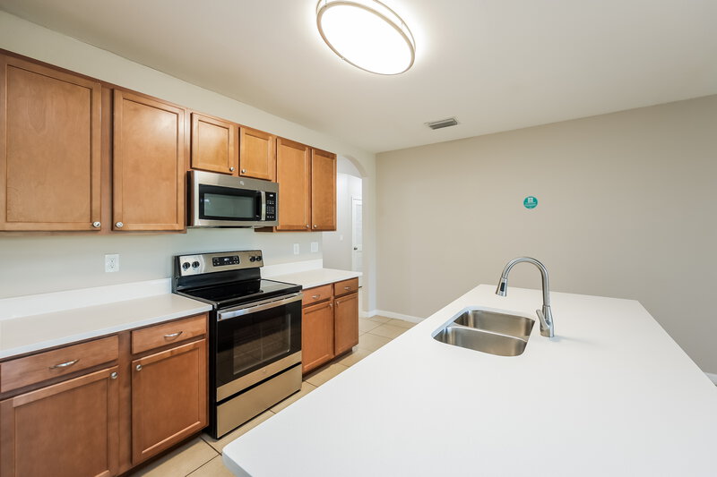 2,180/Mo, 509 SW 11th Ave Cape Coral, FL 33991 Kitchen View 2