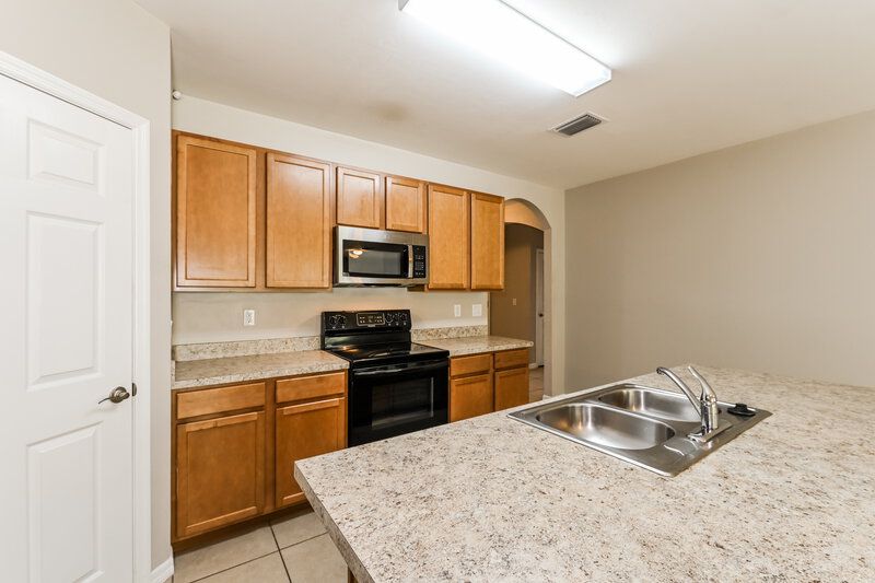 1,990/Mo, 806 SW 11th Ave Cape Coral, FL 33991 Kitchen View 2