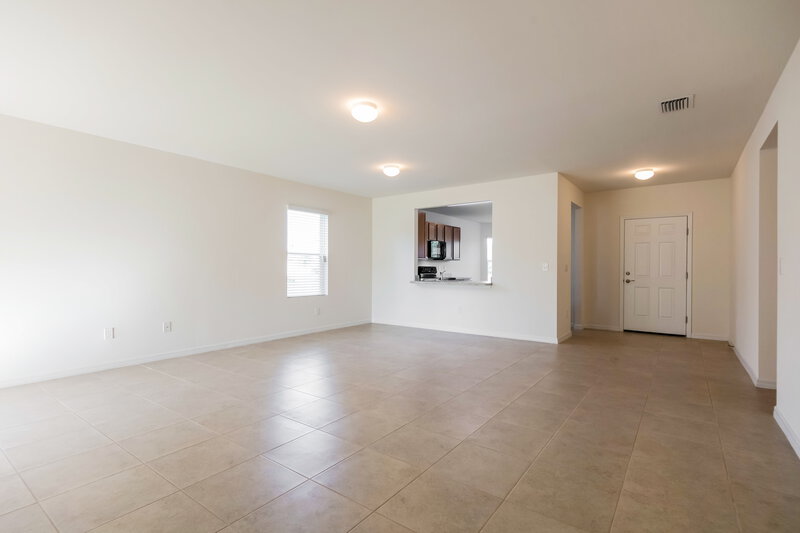 2,570/Mo, 1418 SW 1st Ave Cape Coral, FL 33991 Living Room View 2