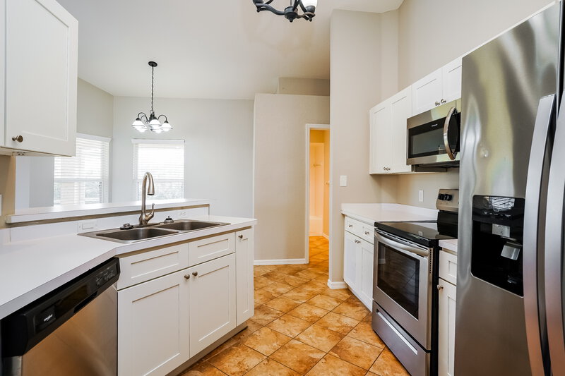 2,220/Mo, 3729 SW 1st Pl Cape Coral, FL 33914 Kitchen View 2