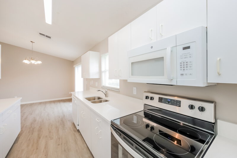 1,685/Mo, 3005 9th St W Lehigh Acres, FL 33971 Kitchen View 2