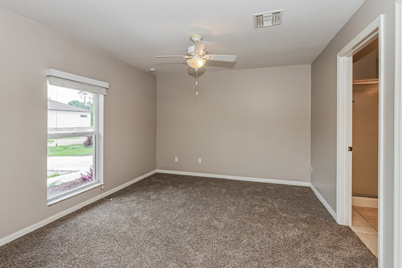 1,480/Mo, 1022 Anaconda Ave S Lehigh Acres, FL 33974 Main Bedroom View