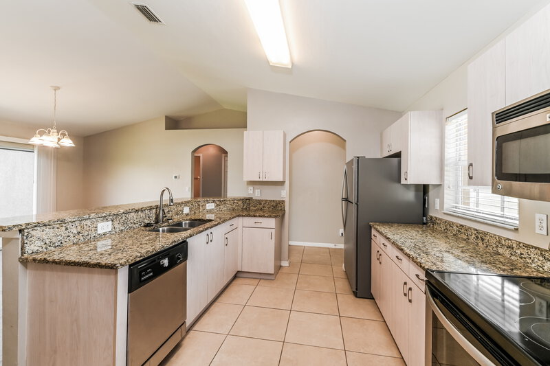 1,950/Mo, 607 Bell Blvd S Lehigh Acres, FL 33974 Kitchen View 2