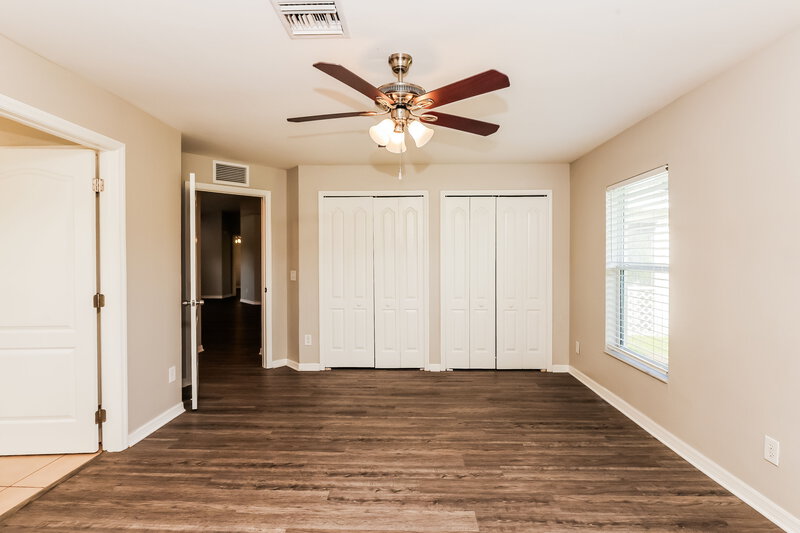 1,750/Mo, 935 Green St E Lehigh Acres, FL 33974 Main Bedroom View