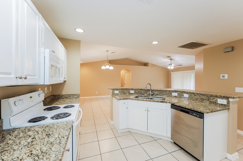 2,520/Mo, 920 Anthony St E Lehigh Acres, FL 33974 Kitchen View 2