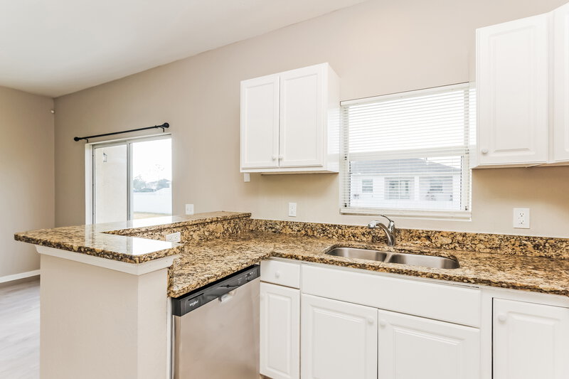 1,590/Mo, 3005 21st St SW Lehigh Acres, FL 33976 Kitchen View 2