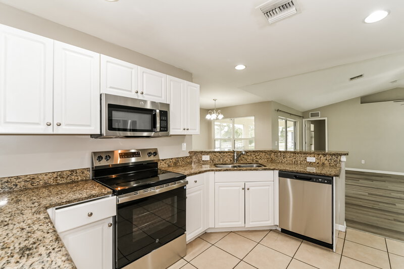 1,650/Mo, 3608 5th St SW Lehigh Acres, FL 33976 Kitchen View 2